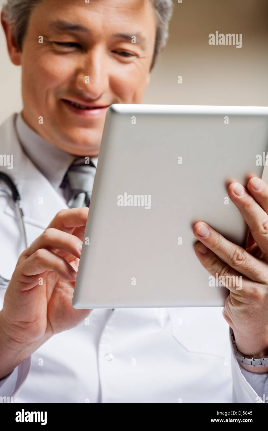 Doctor Using Digital Tablet Stock Photo