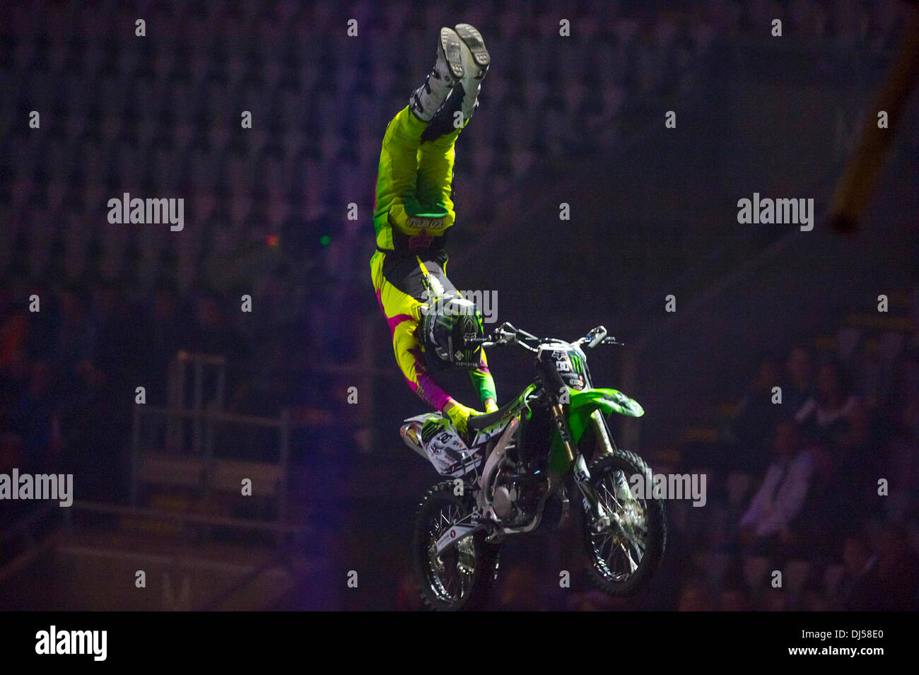 Oslo, Norway. 21st November 2013. Andre Villa does a super man seat grab freestyle motocross trick during the Nitro Circus Live 2013 at the Telenor Arena