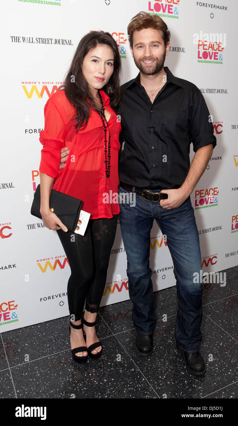 Alex Hassell and Guest 'Peace, Love, & Misunderstanding' New York Screening at MOMA New York City, USA - 04.06.112 Stock Photo