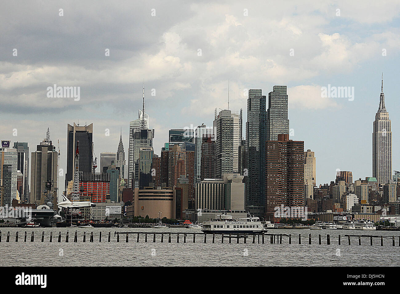 The NASA space shuttle prototype Enterprise is lowered by crane into