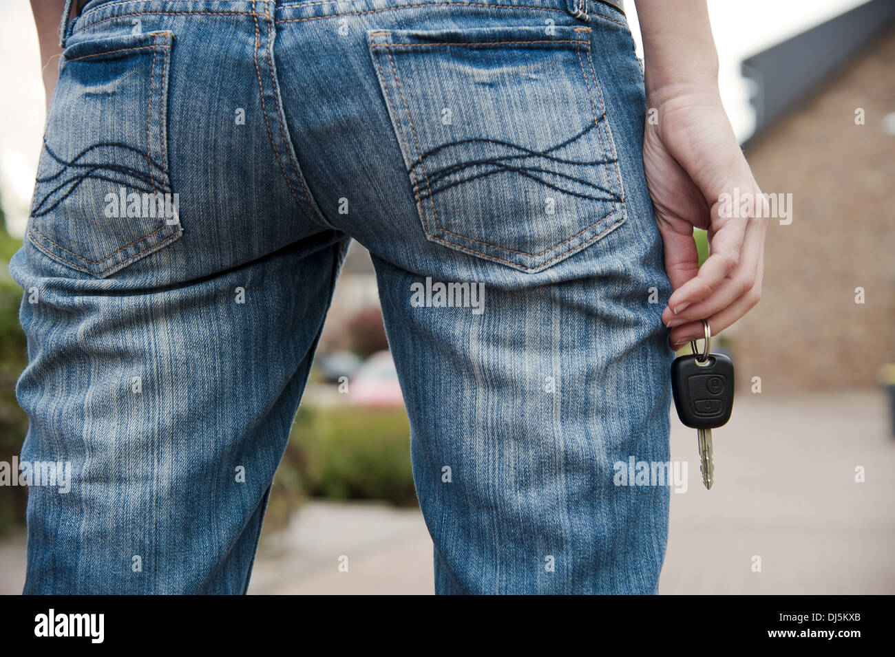Keys Rear View Rear view of a person with car keys Stock Photo - Alamy