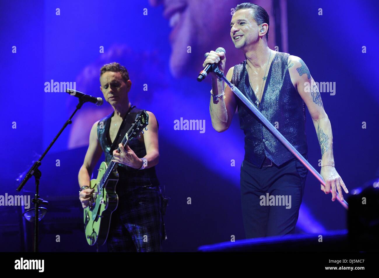 Cologne, Germany. 21st Nov, 2013. Singer Dave Gahan (R) and guitarist  Martin Gore from the band Depeche Mode stands during the first German  concert of the European winter tour at Lanxess Arena