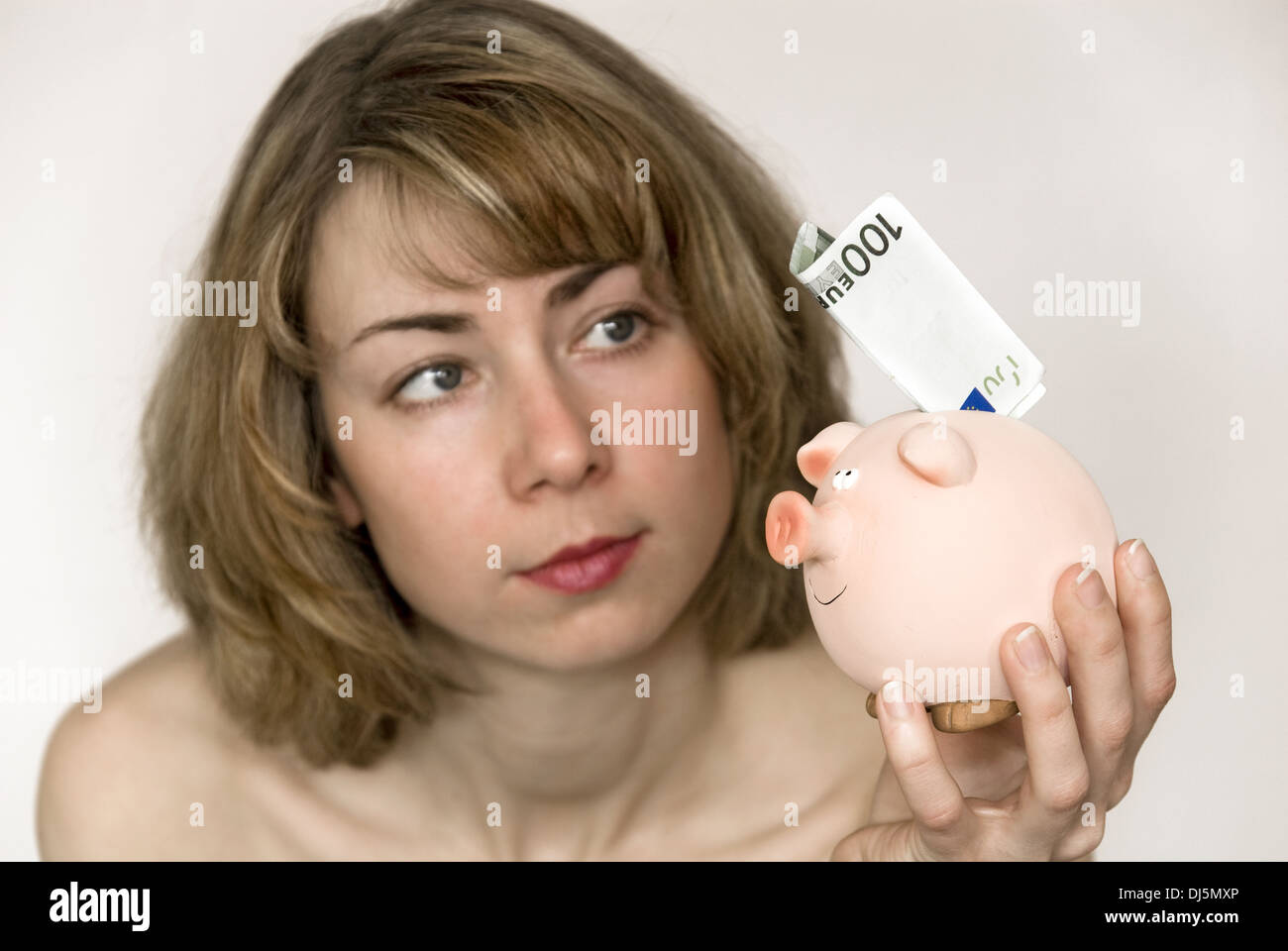 woman and piggy bank Stock Photo Alamy