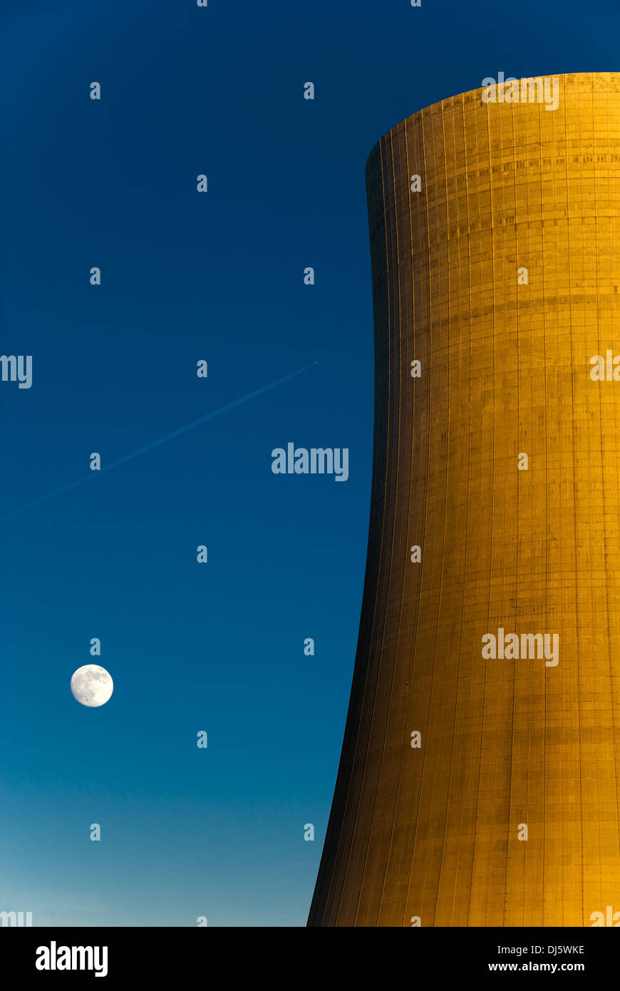 Cooling tower with moon and airplane Stock Photo