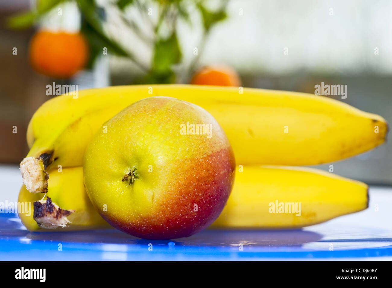 2 bananas and 1 apple Stock Photo
