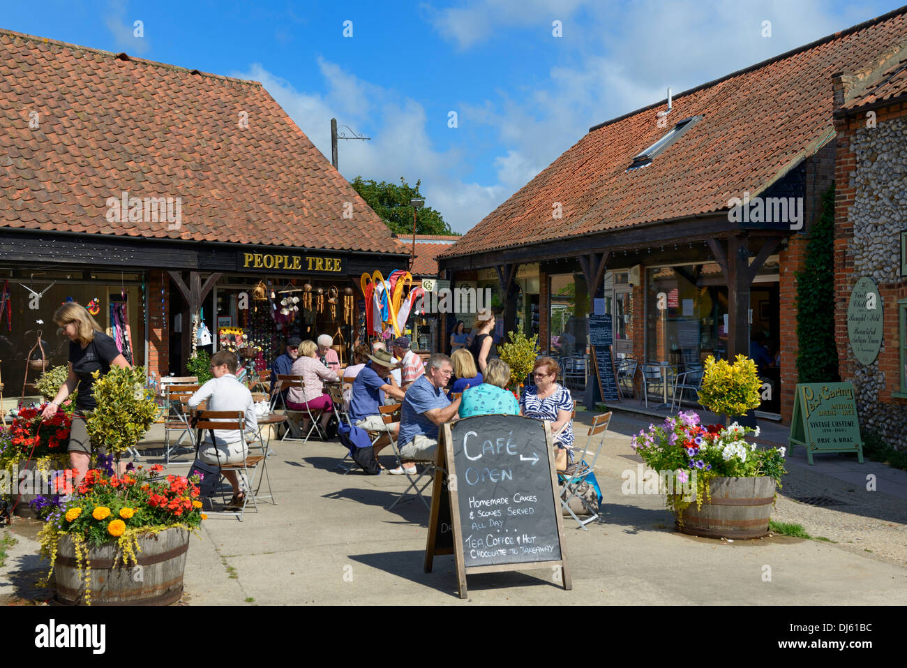 Alfresco café outside shops, Chapel Yard, Holt, Norfolk, England, United Kingdom, UK, Europe Stock Photo