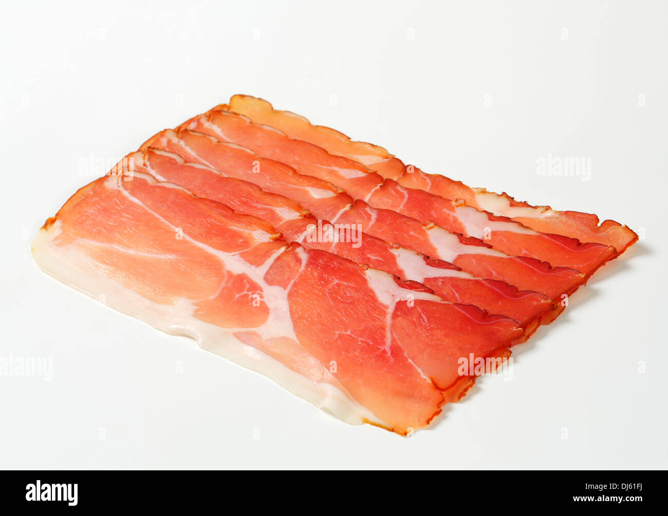 Thin slices of dry-cured smoked ham (Schwarzwald ham) Stock Photo