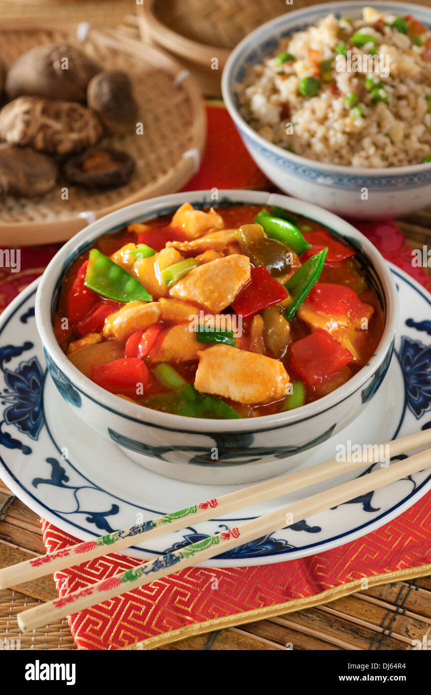 Sweet and sour chicken with egg fried rice. Chinese food. Stock Photo