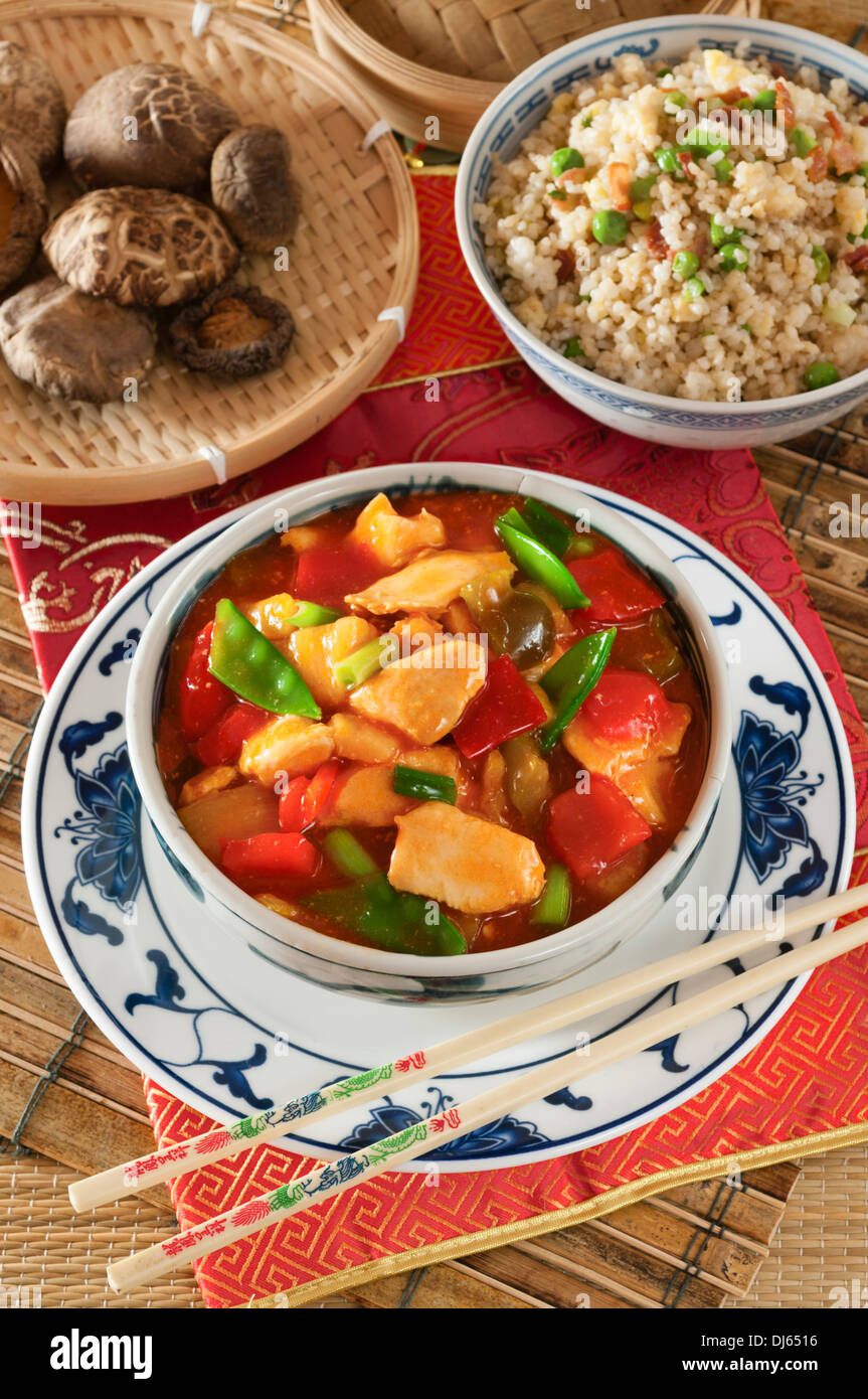 Sweet and sour chicken with egg fried rice. Chinese food. Stock Photo