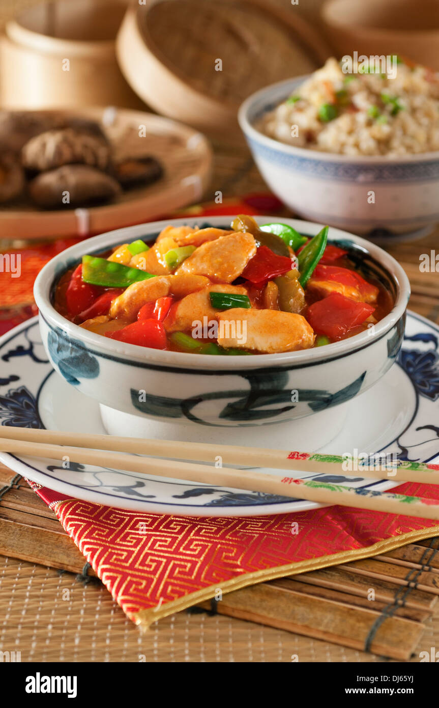 Sweet and sour chicken with egg fried rice. Chinese food. Stock Photo