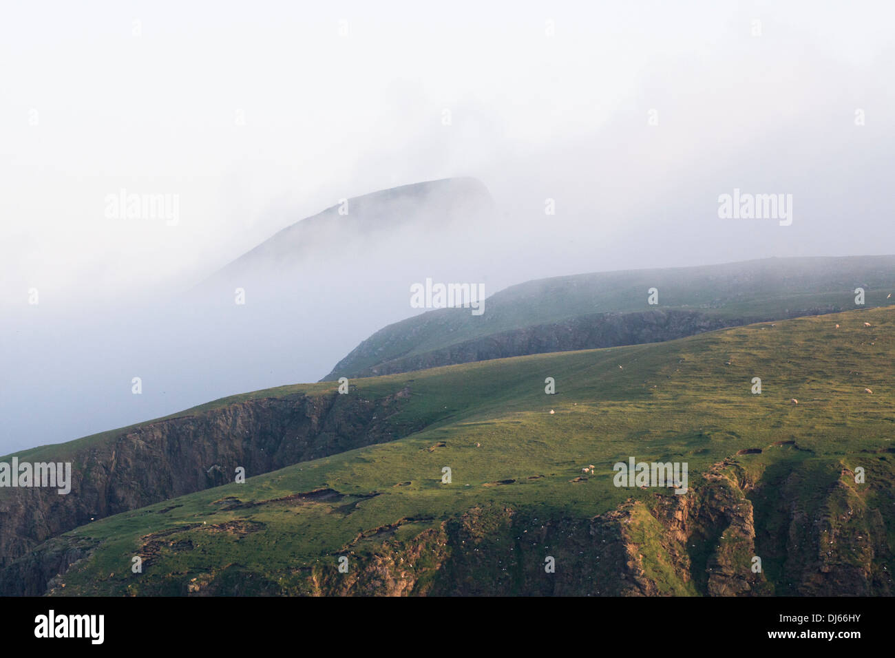 Hills on Fair Isle shrouded in mist Stock Photo