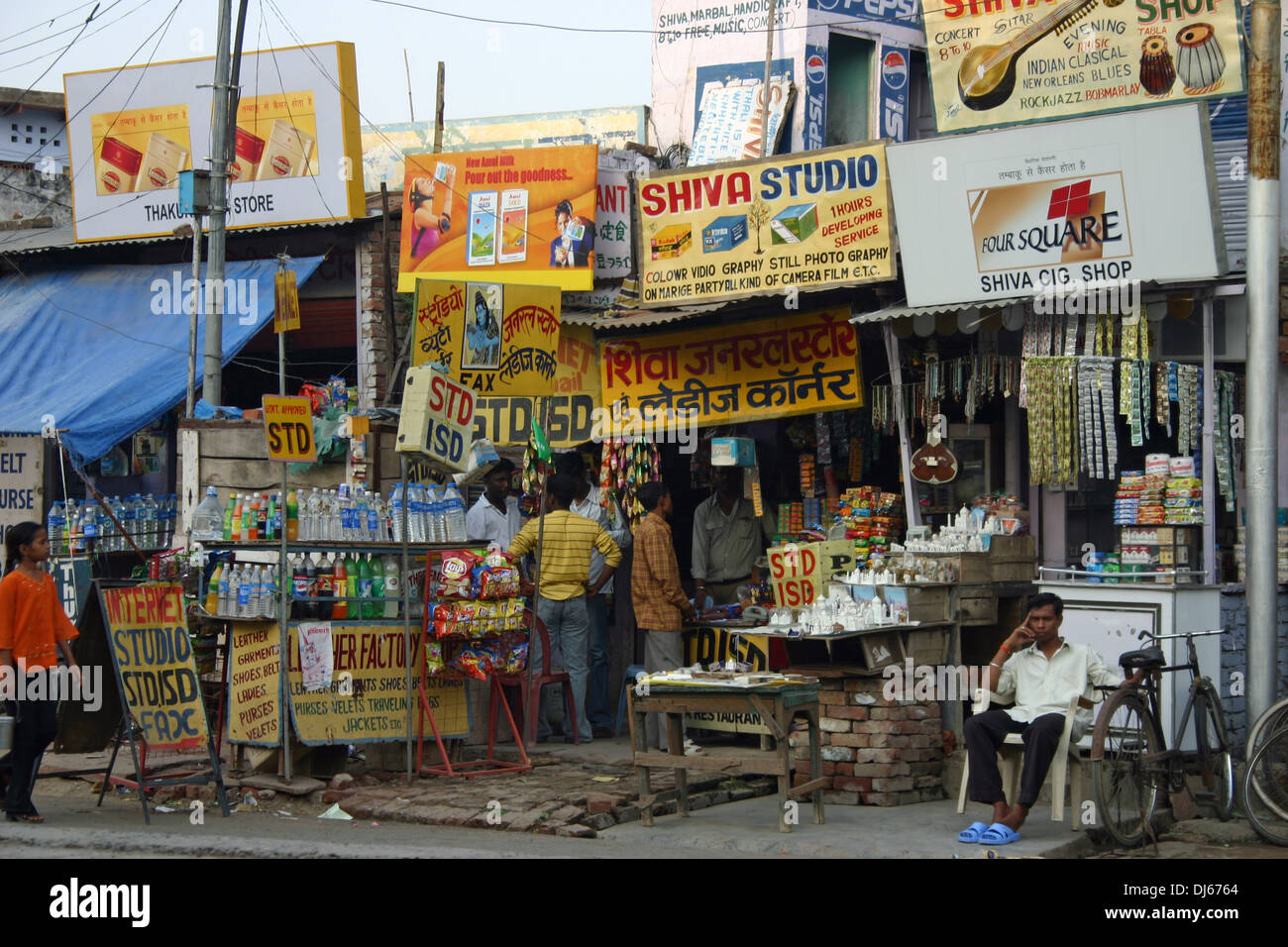 A traditional Indian shop and store in New Delhi, India with men and a