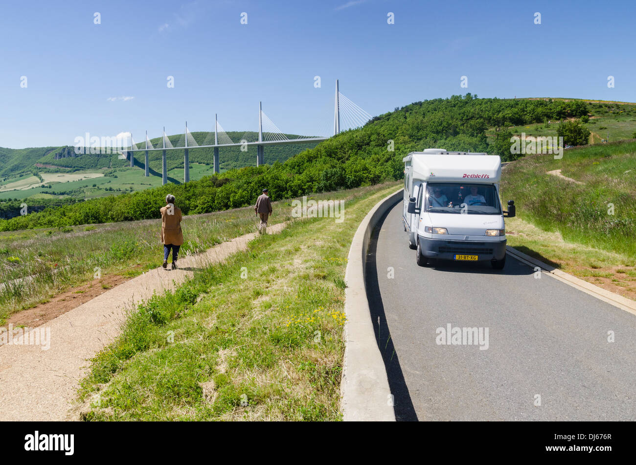 Tourists at the Millau Viaduct, a cable-stayed bridge near the town of Millau in southern France Stock Photo
