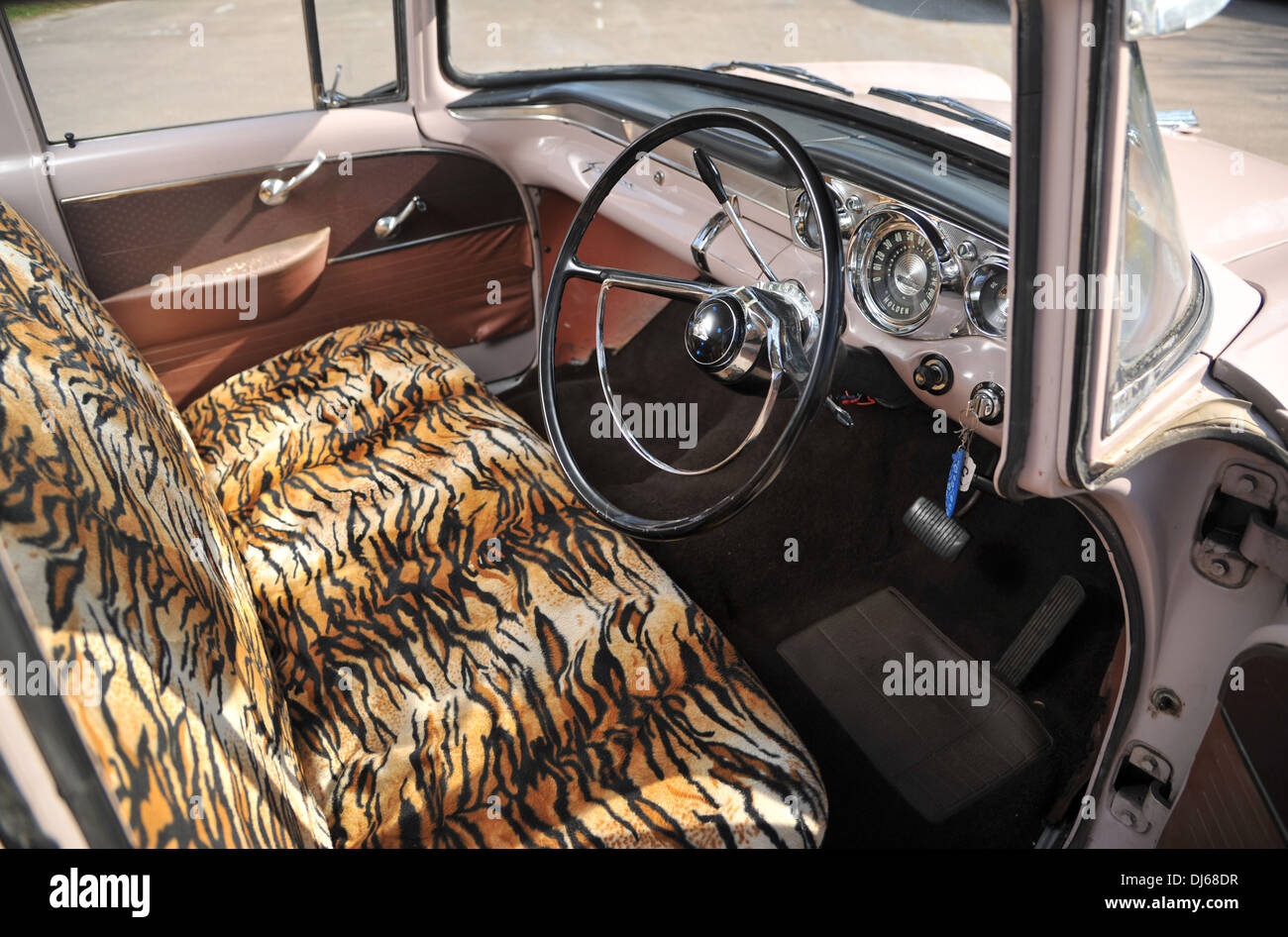 Pink 1962 Holden EK classic Australian car with leopard skin print seats Stock Photo