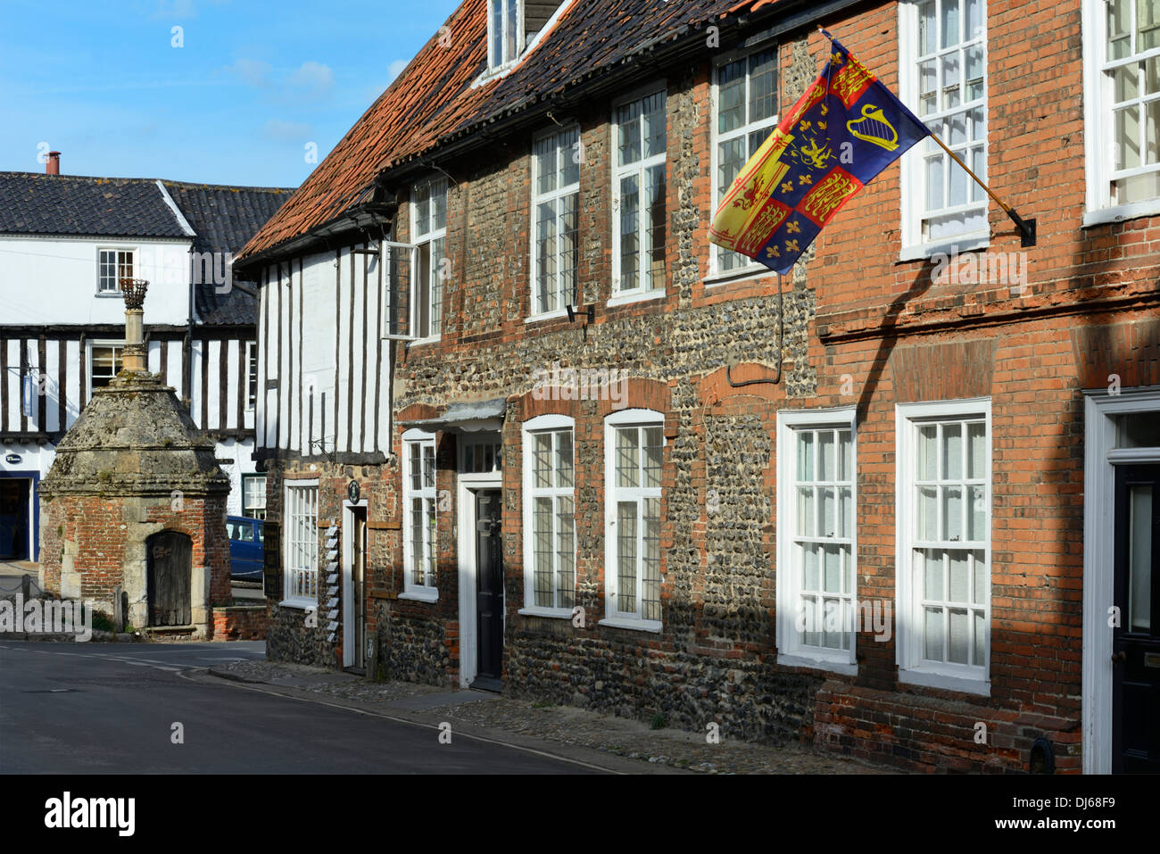 Medieval buildings and village pump house, High Street, Little Walsingham, Norfolk, England