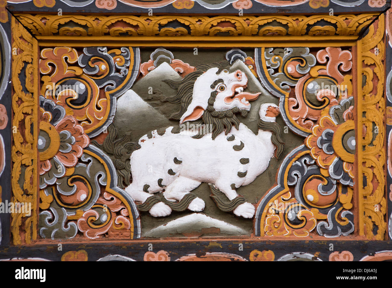 Bhutan, Punakha Dzong, carved snow lion, decorative wooden panel Stock Photo