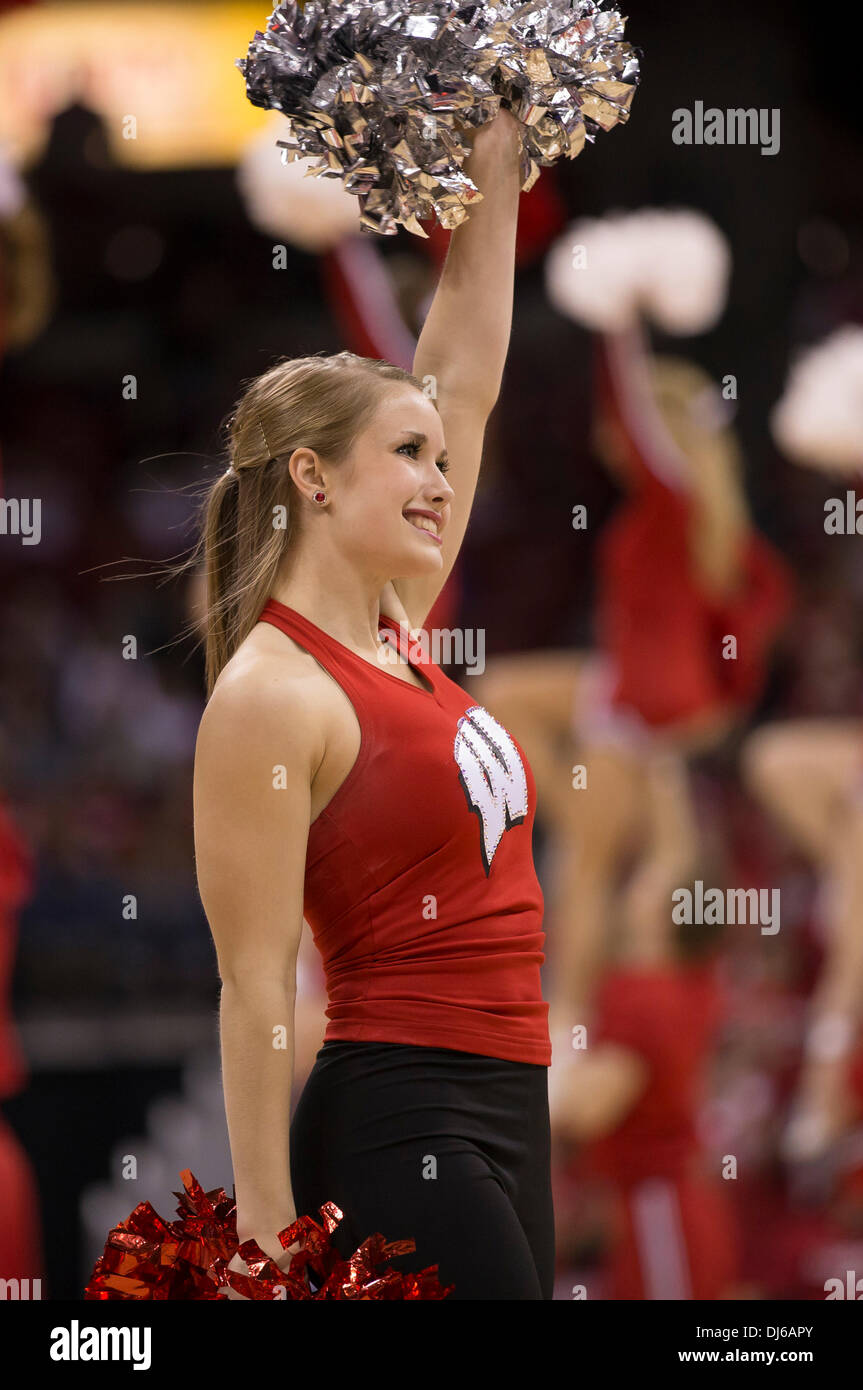 Madison, Wisconsin, USA. 21st Nov, 2013. November 21, 2013: Wisconsin Cheerleader entertains crowd during the NCAA Basketball game between the Bowling Green Falcons and the Wisconsin Badgers at the Kohl Center in Madison, WI. Wisconsin defeated Bowling Green 88-64. John Fisher/CSM/Alamy Live News Stock Photo