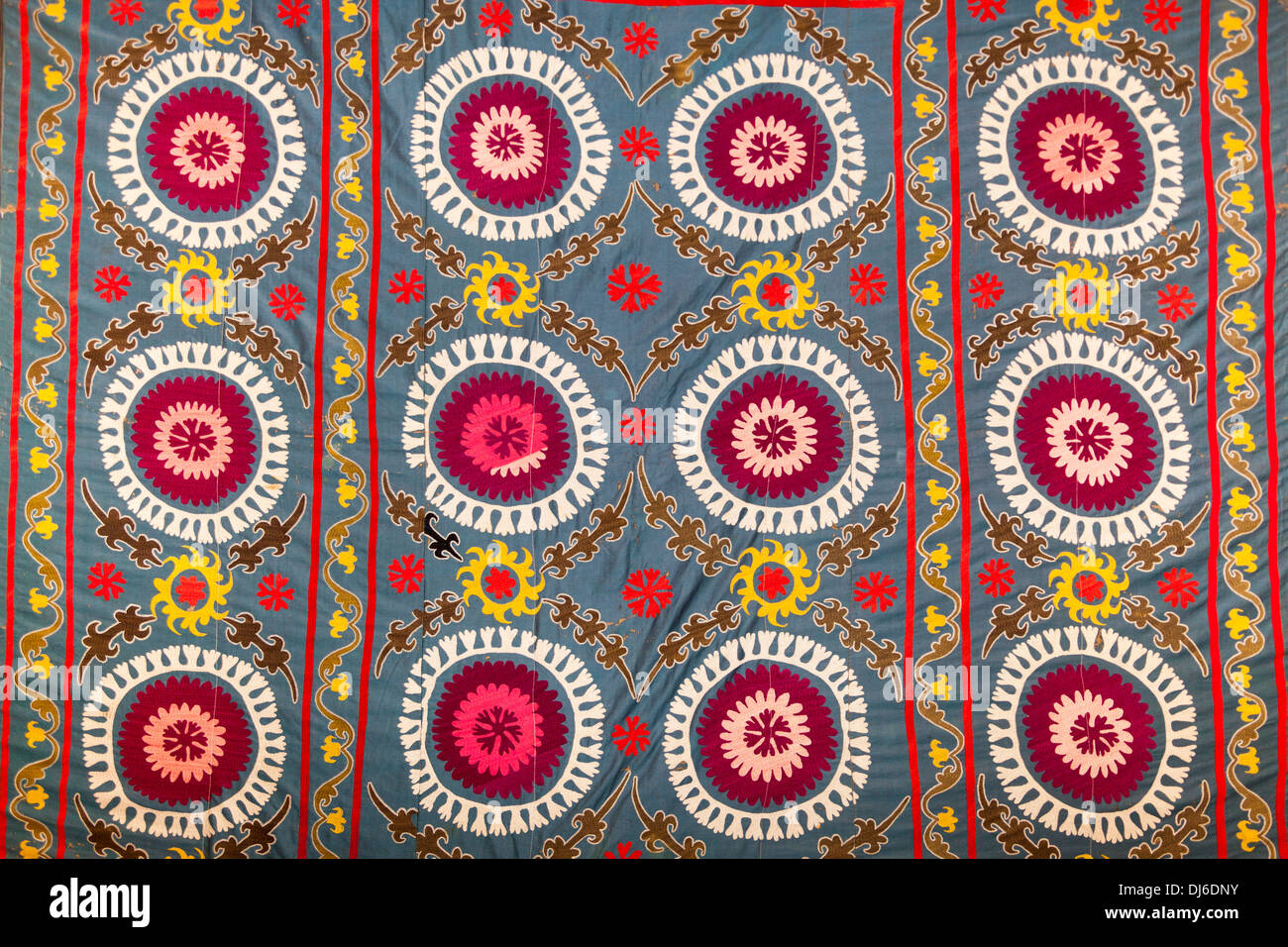 A Suzani textile from Andijan, cotton hand embroidered needlework on satin, Museum of Applied Arts, Tashkent, Uzbekistan Stock Photo