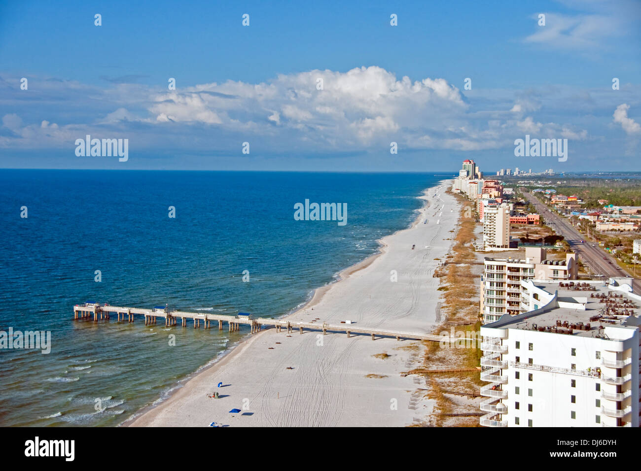 Alabama Gulf Coast's Orange Beach fishing pier and condos. Stock Photo