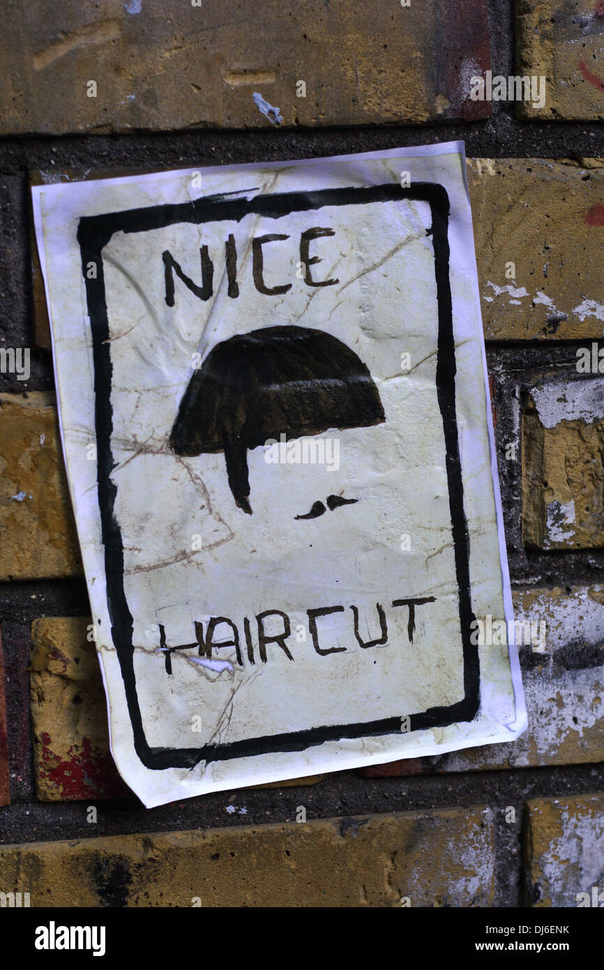 graphic art photographed on a wall in shoreditch brick lane Stock Photo