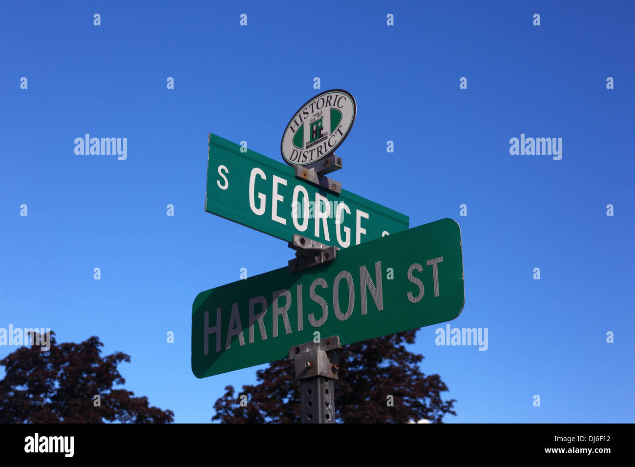 Signs at crossroads of George and Harrison Streets, Cumberland , Allegany County , Maryland , USA Stock Photo