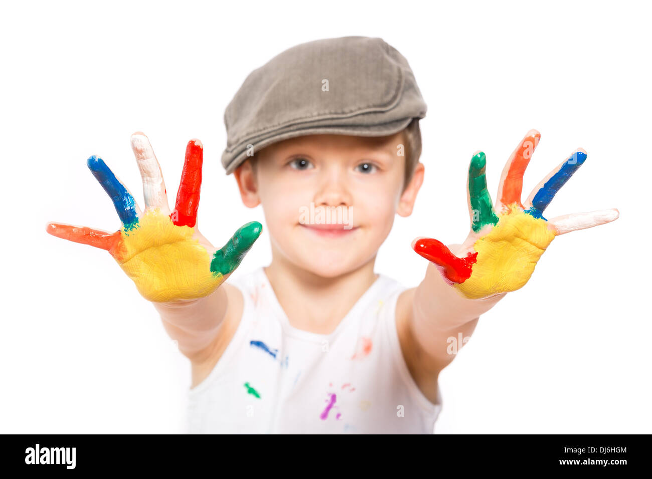 little boy with hands in paint isolated on white Stock Photo