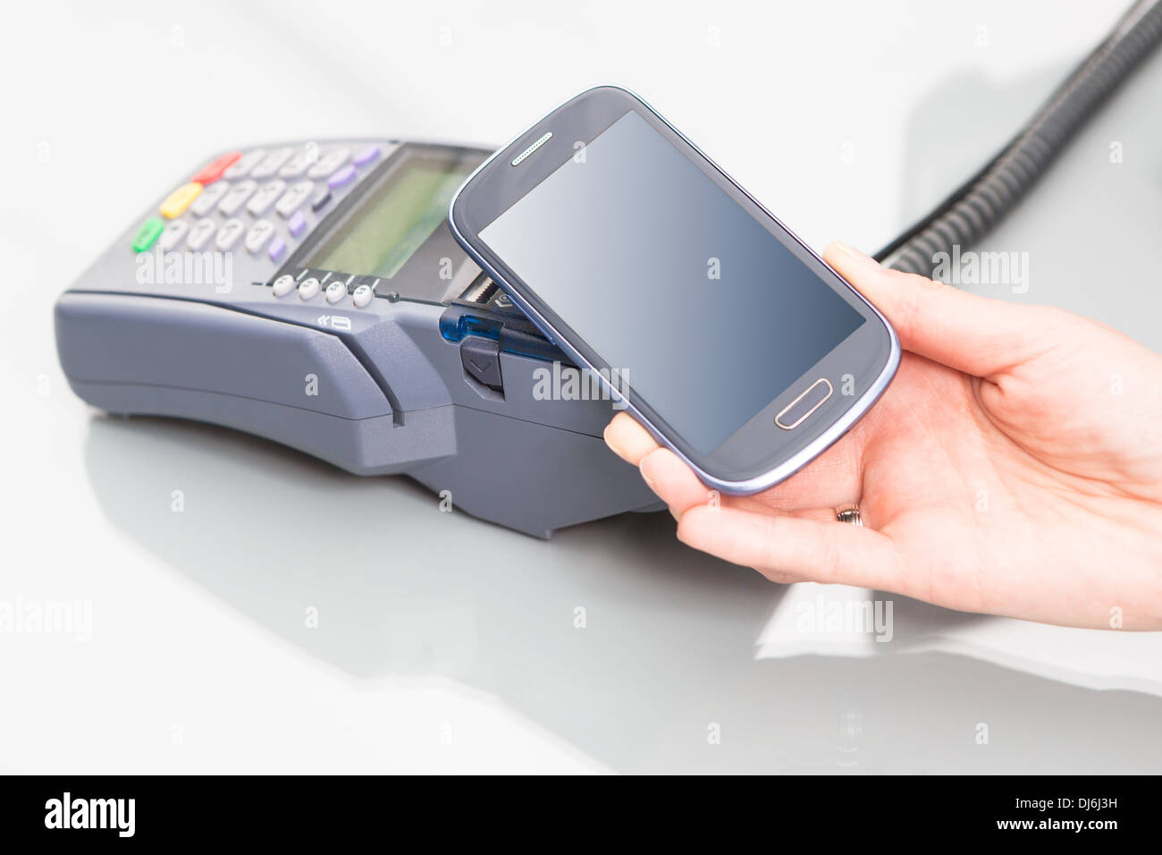NFC Near field communication, mobile payment Stock Photo Alamy