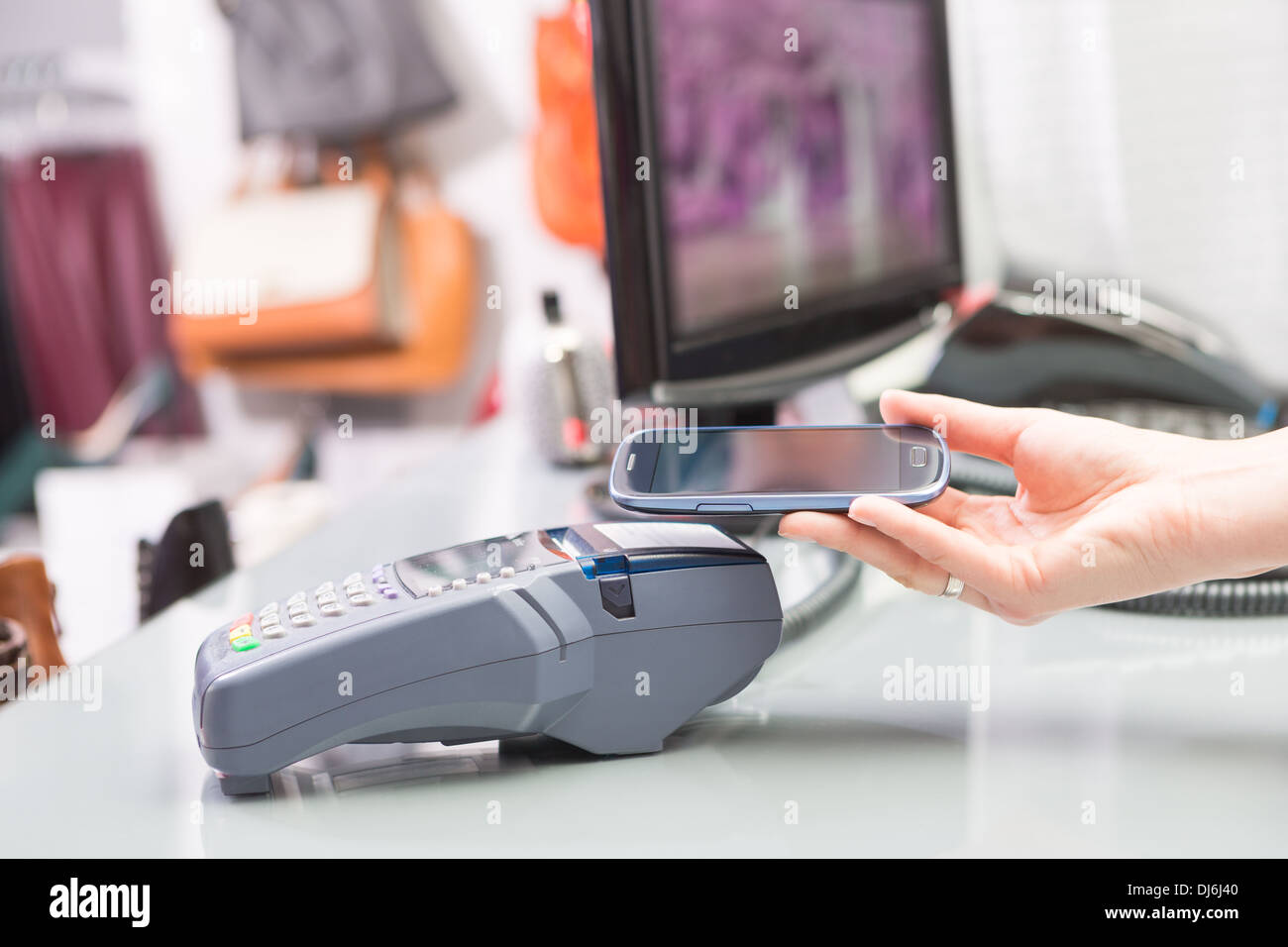 NFC Near field communication, mobile payment Stock Photo Alamy