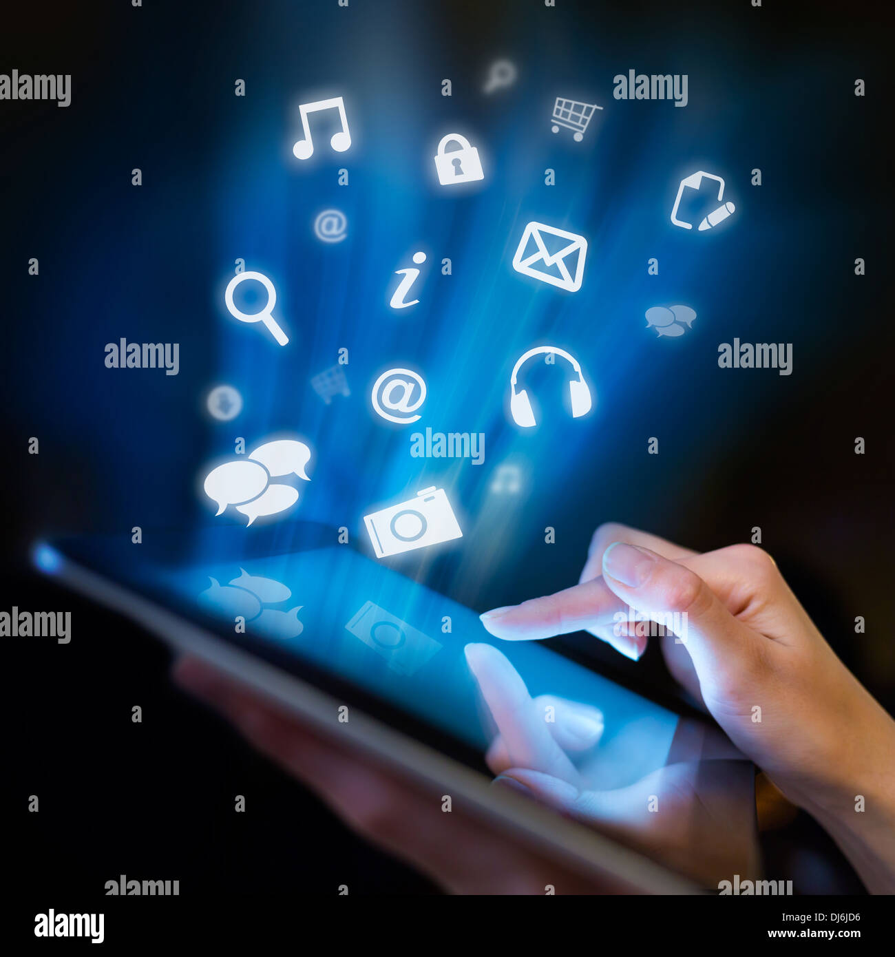 Hand touching digital tablet, social media concept Stock Photo