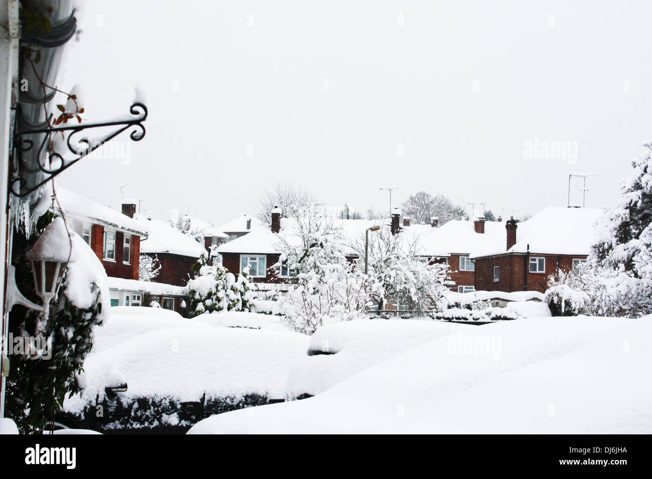 Snow covered houses in winter season Stock Photo Alamy