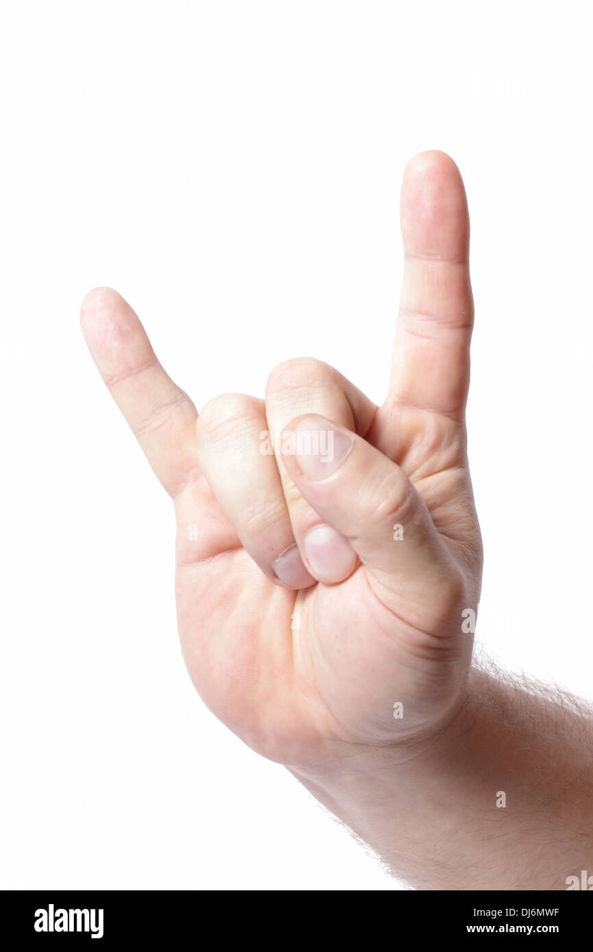 Hand making the heavy metal gesture. Isolated on white background. Stock Photo