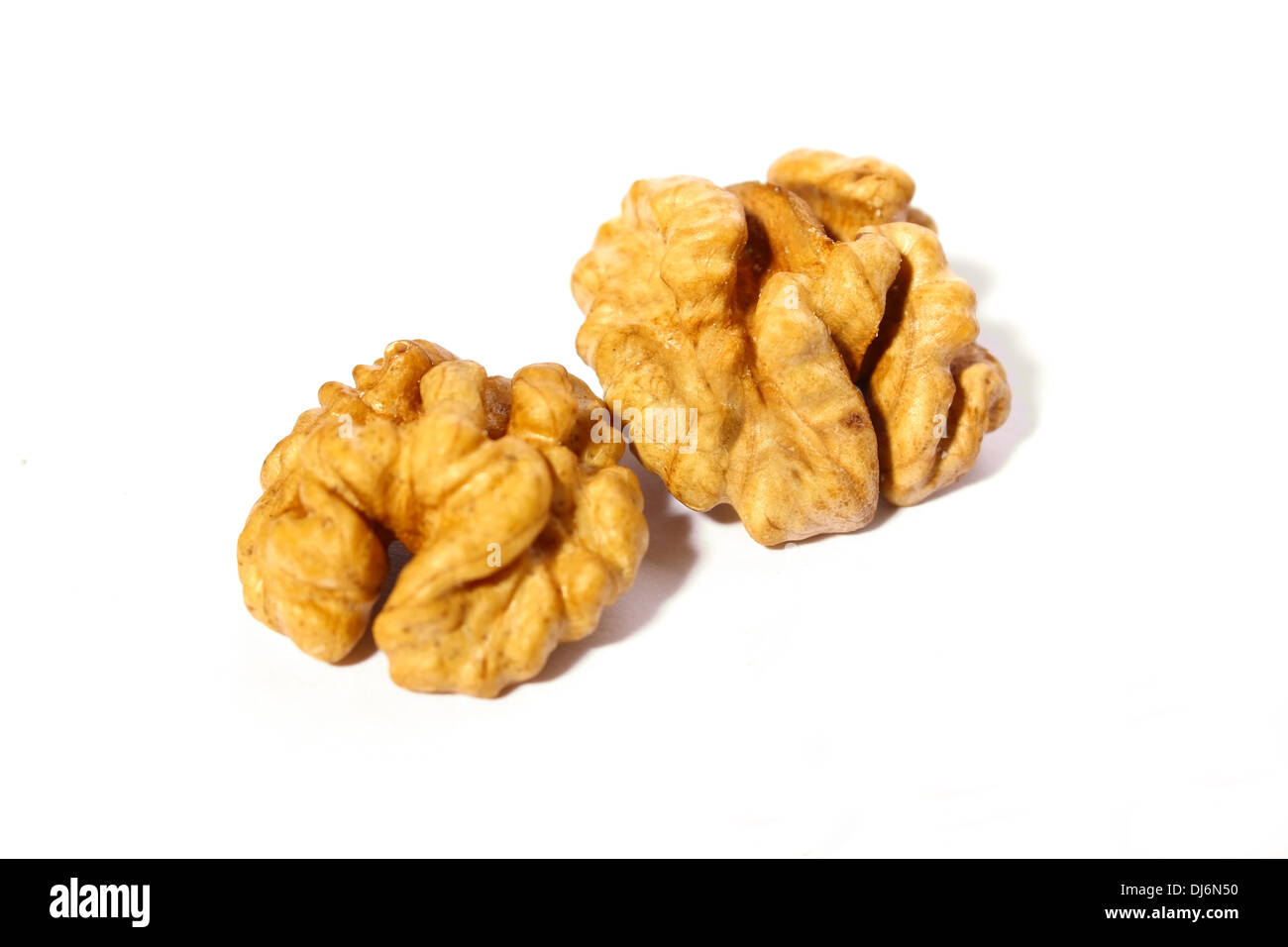 The walnuts, two halves of the nut, cleared nut, Грецкие орехи, две половинки ореха, очищенные орехи Stock Photo