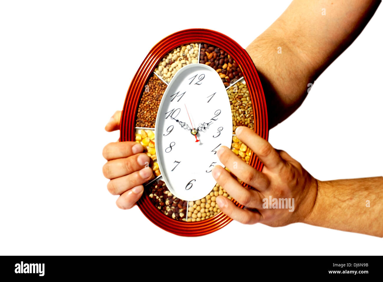 Mens hands hold the clock hires stock photography and images Alamy