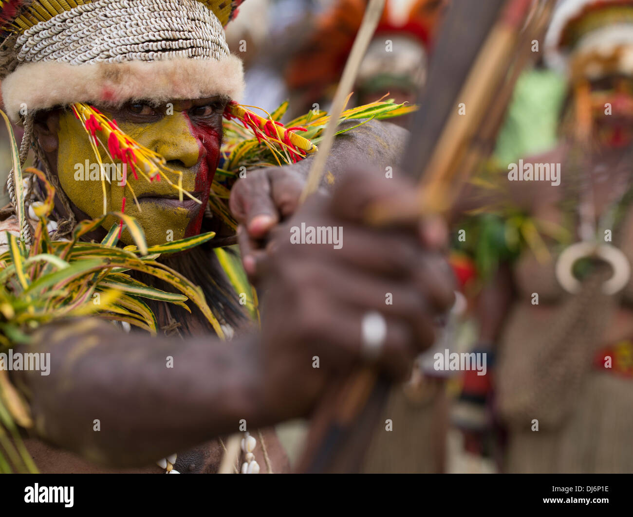 Archer with bow and arrow, Goroka Province Singsing Group Memeber, Goroka Show, Papua New Guinea Stock Photo