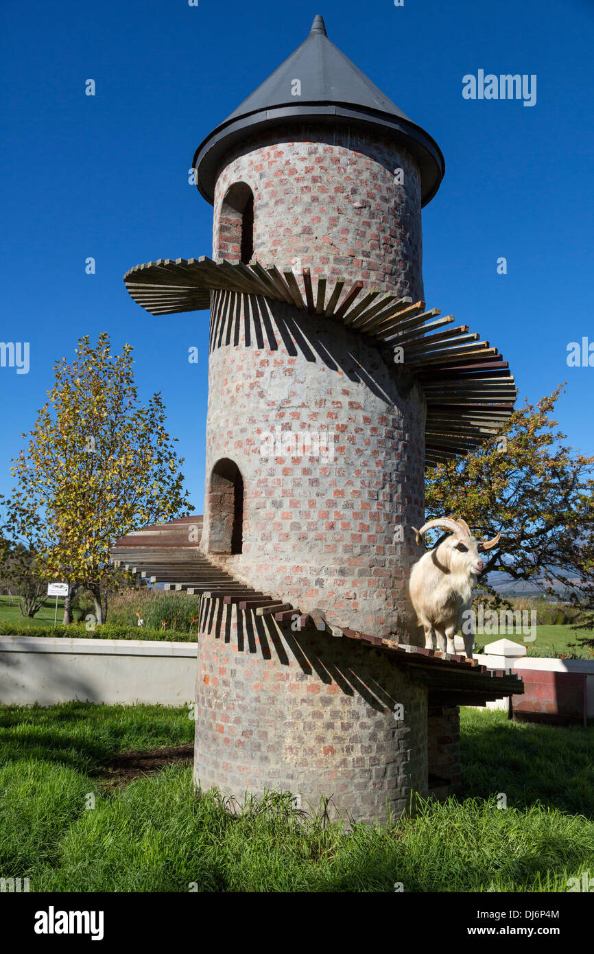 South Africa. A Saanen Goat, a Swiss Breed, on the Goat Tower at Fairview Winery, Paarl area, near Cape Town. Stock Photo