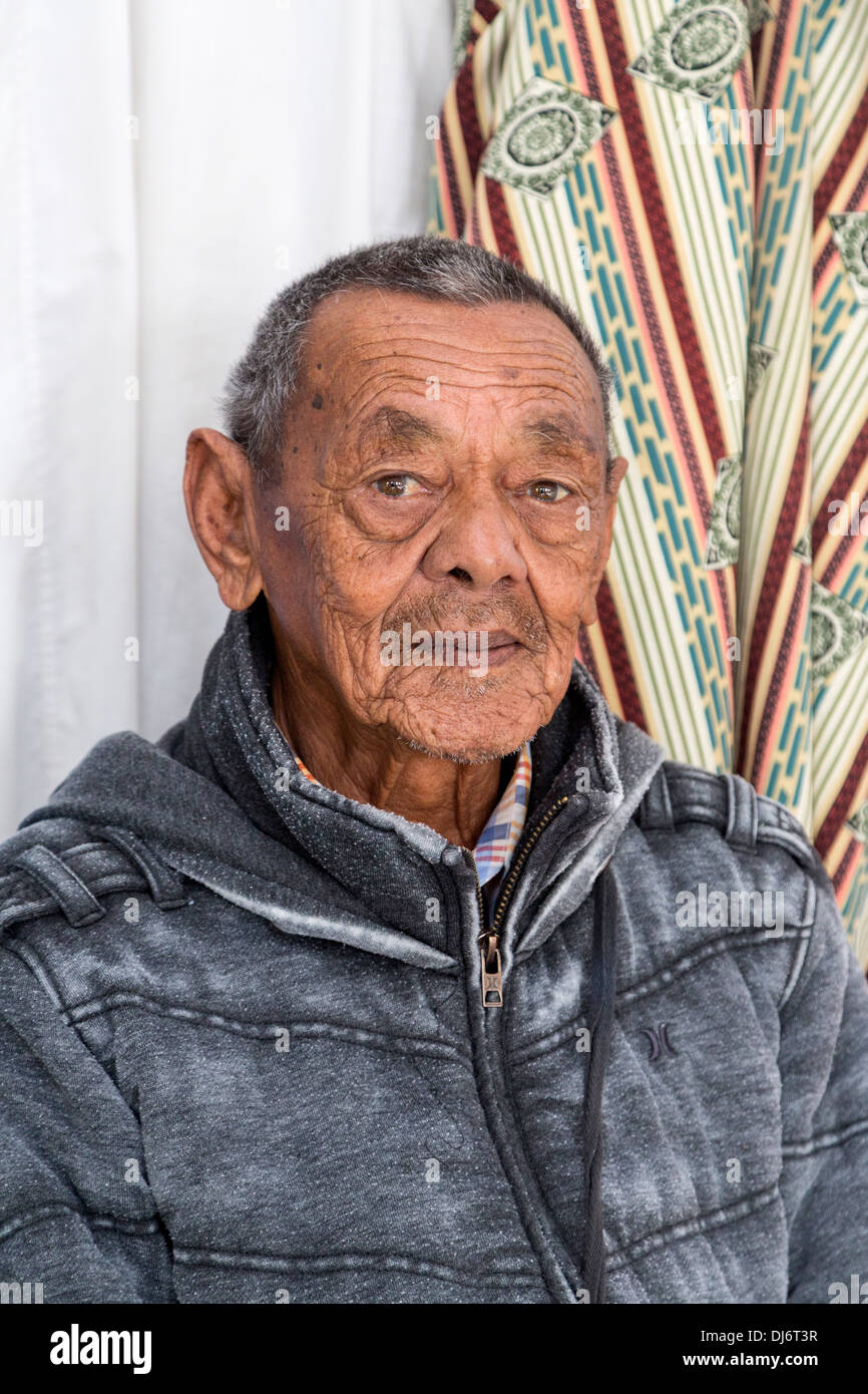 South Africa. Cape Town, Bo-kaap. Local Resident in the Nurul Huda Mosque. Stock Photo