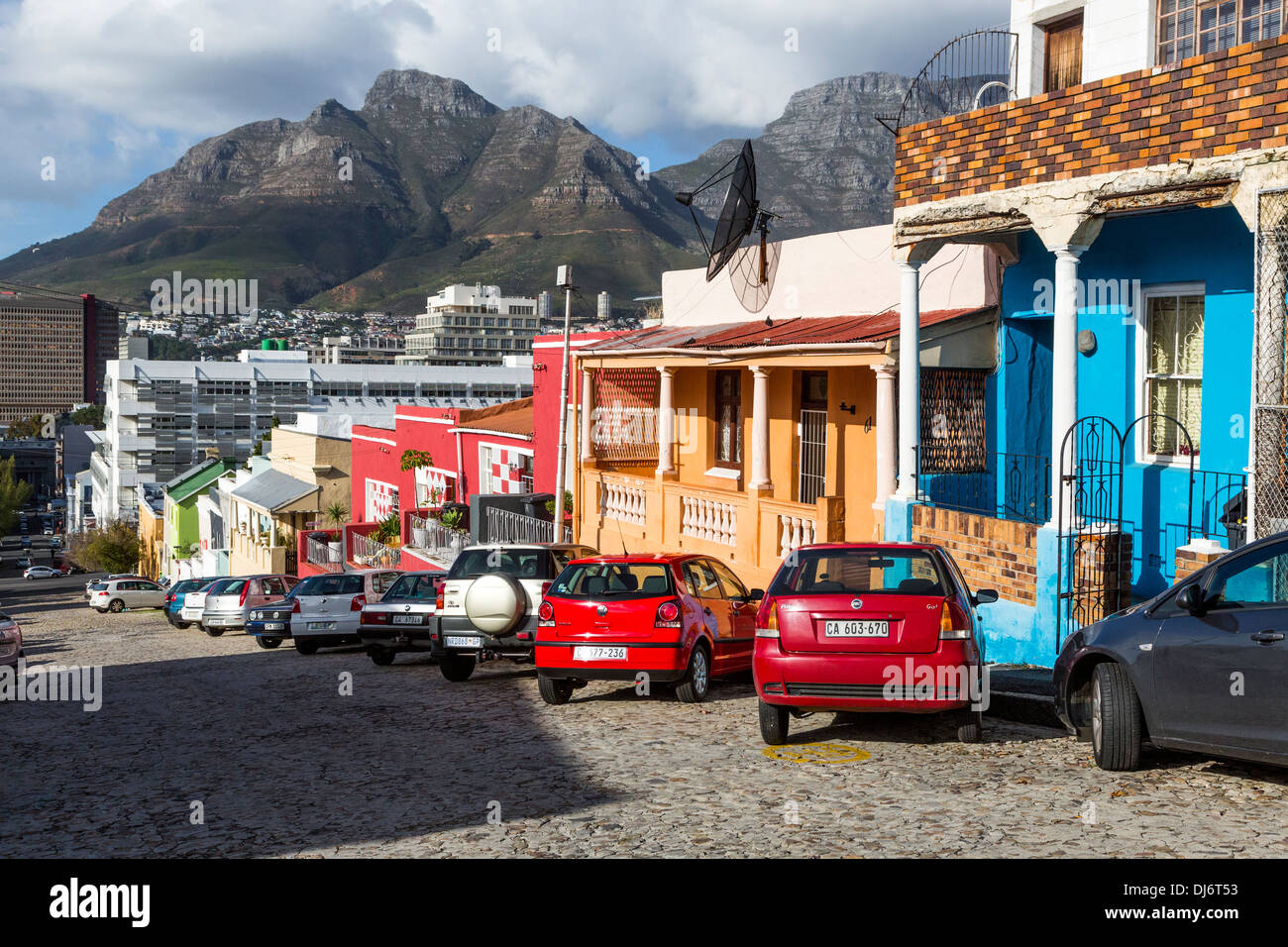 South Africa, Cape Town, Bo-kaap Street Scene. Table Mountain in background. Stock Photo