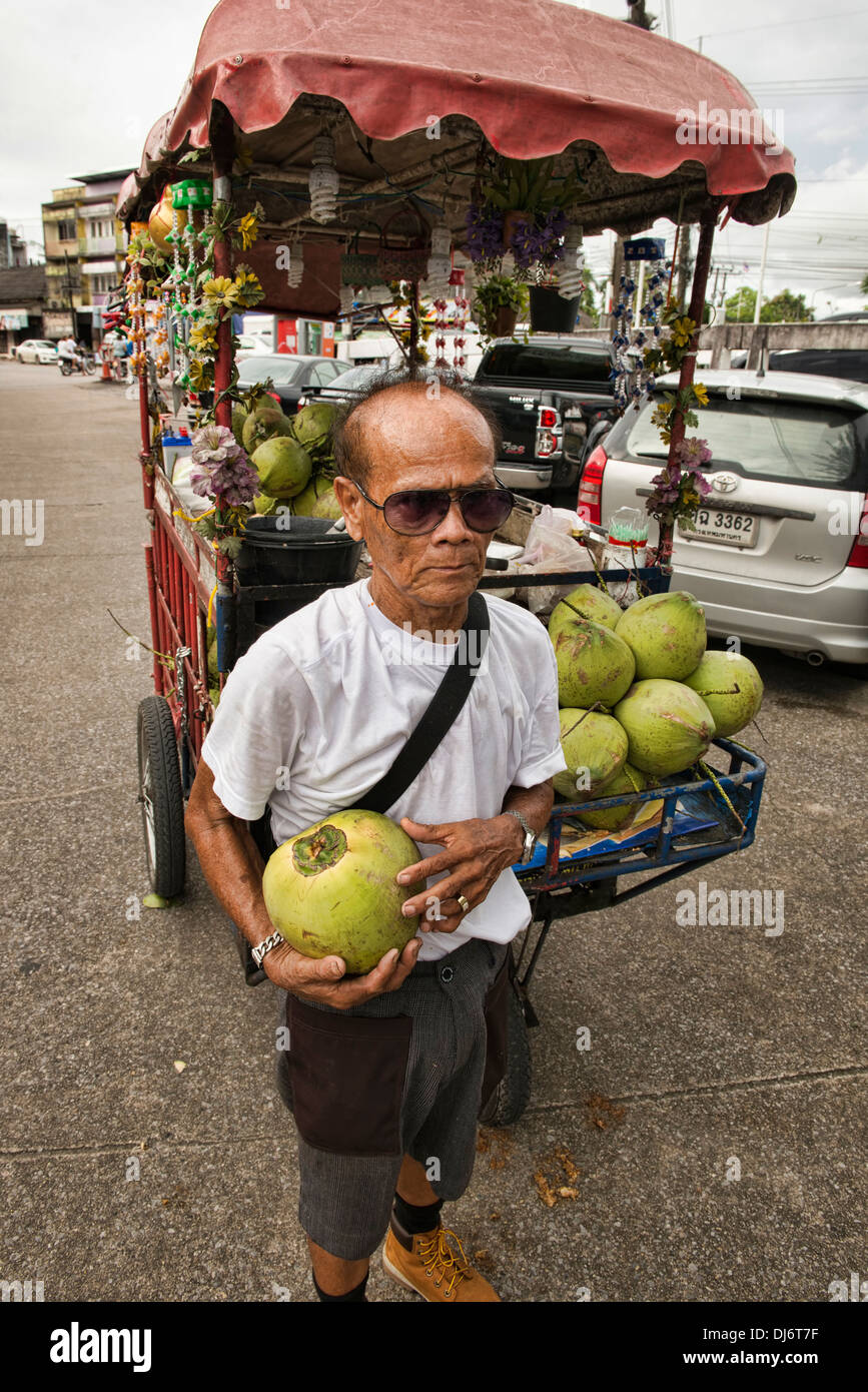 coconut vendor and his cart, Chantaburi, Thailand Stock Photo