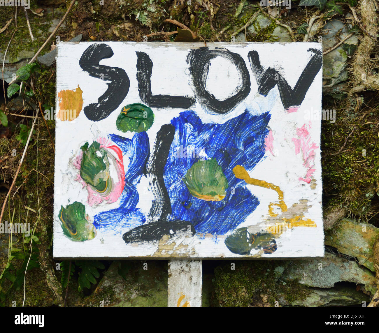 Hand-painted 'SLOW' sign. Crook, Lake District National Park, Cumbria ...