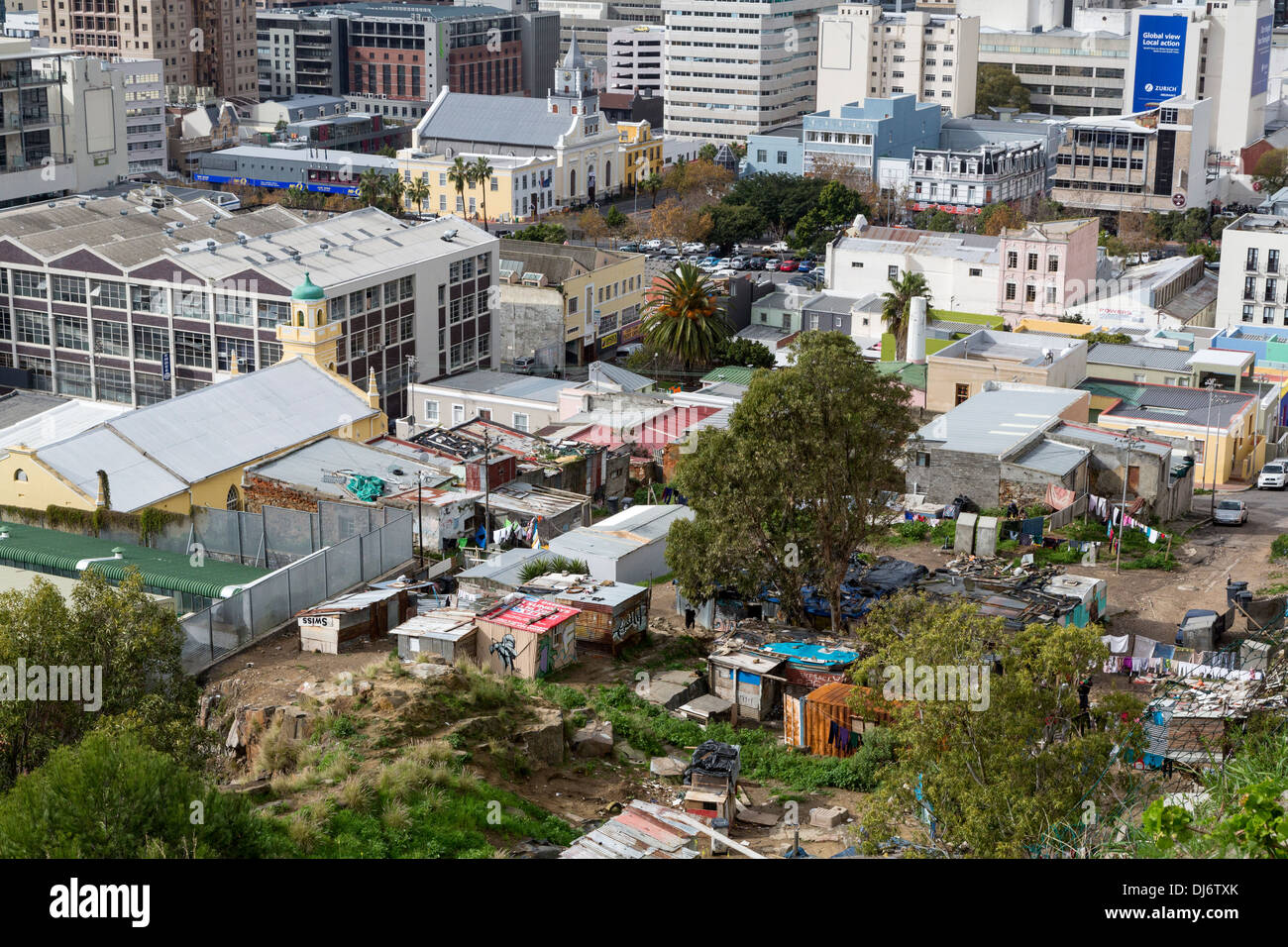 South Africa. Cape Town from Bo-kaap Hill. Shantytown housing at base of hill, in foreground. Stock Photo