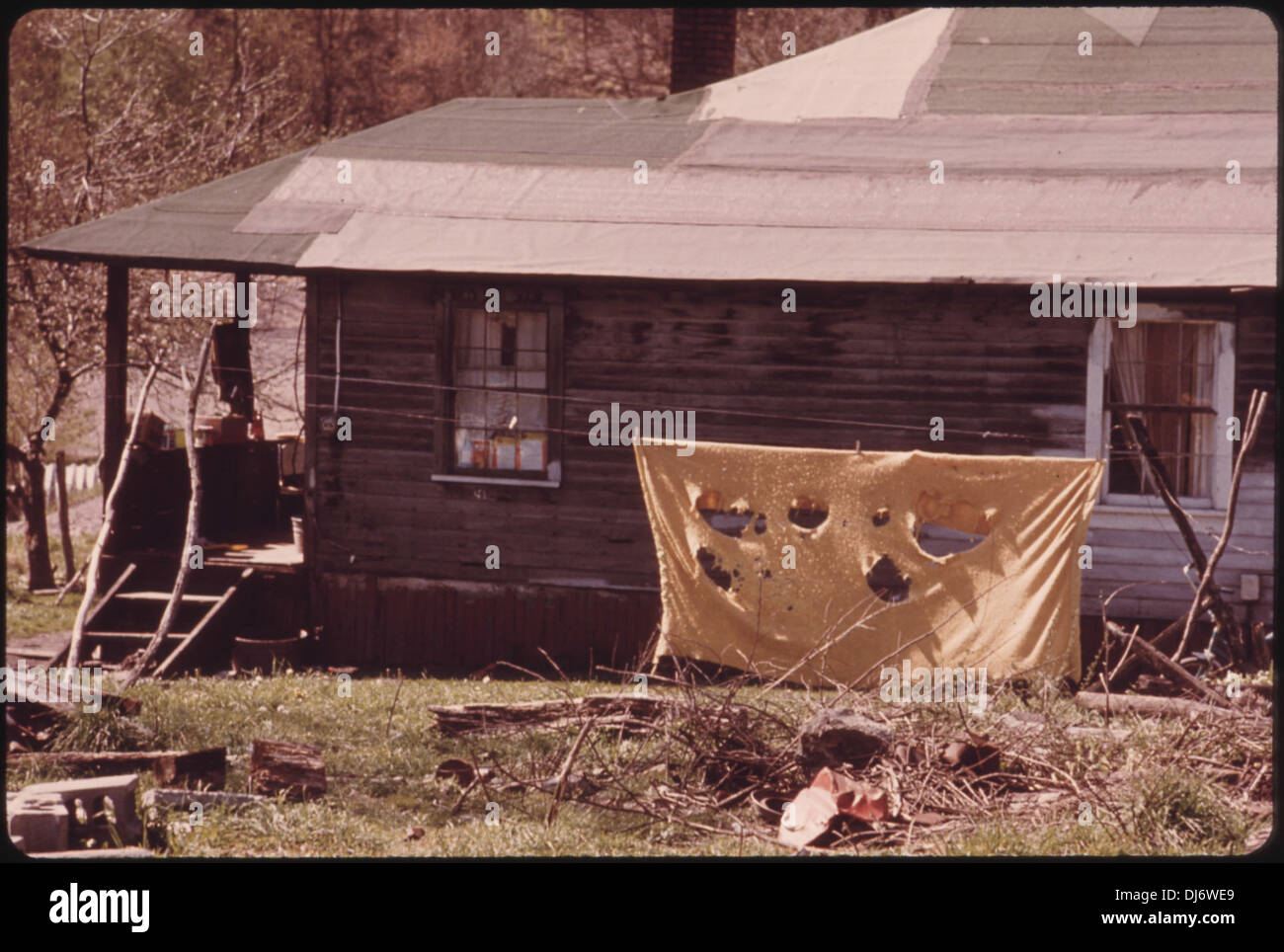 A TATTERED BLANKET HUNG ON A LINE IN FIRECO, WEST VIRGINIA NEAR BECKLEY