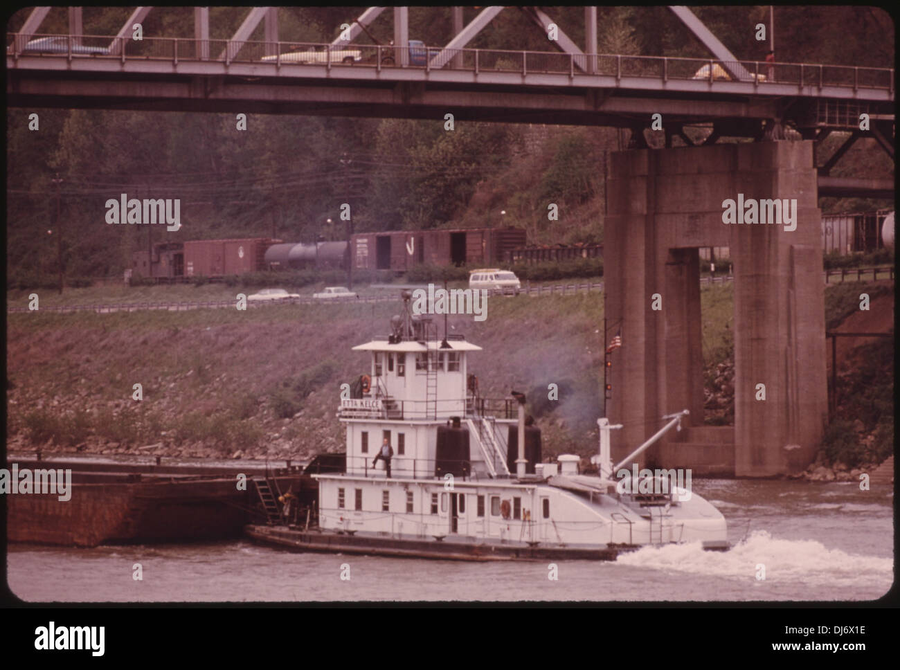 COAL BARGE ON THE KANAWHA RIVER NEAR CHARLESTON, WEST VIRGINIA. GREAT