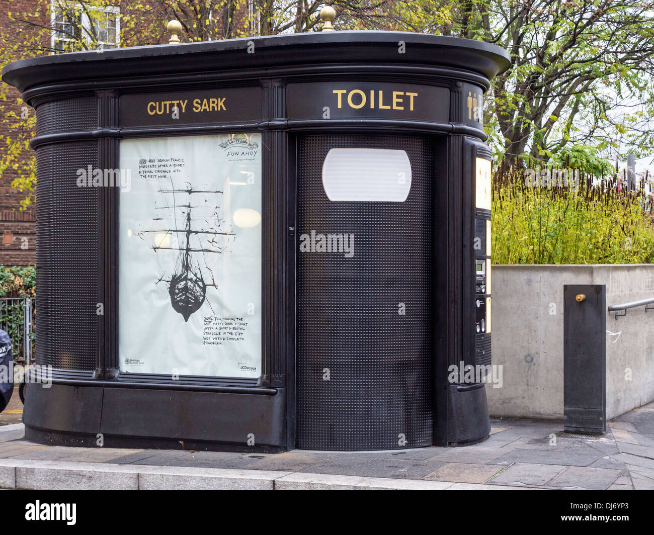 Public unisex toilet and poster at site of the Cutty Sark at Greenwich, London Stock Photo