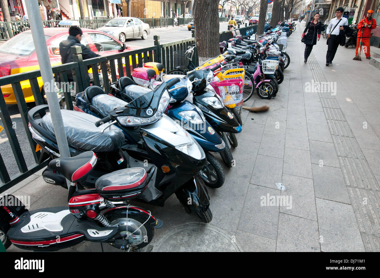 Shop with motor scooters in Beijing, China Stock Photo - Alamy