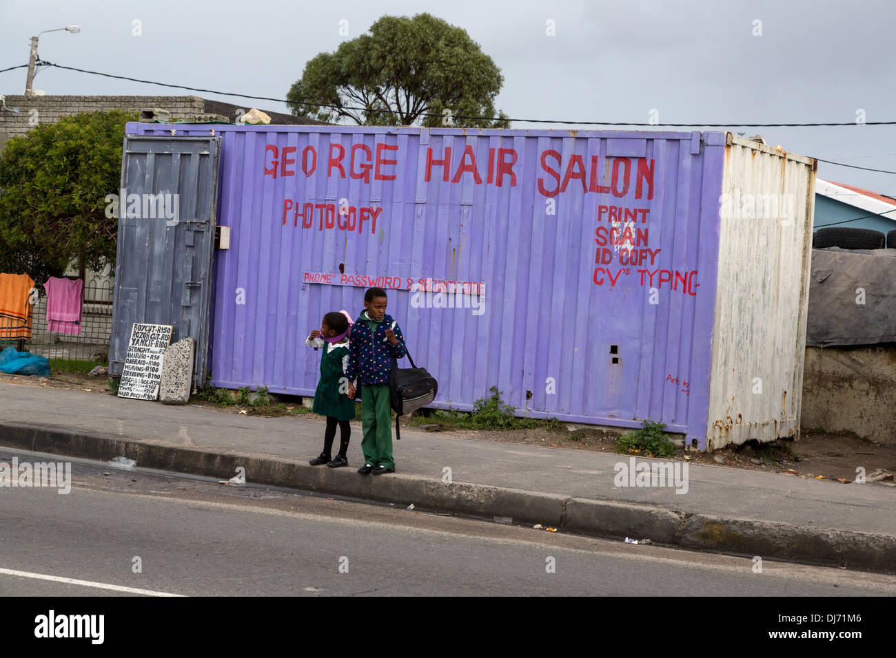 South Africa, Cape Town, Guguletu Township. Hair Salon Occupying a Former Shipping Container. Stock Photo
