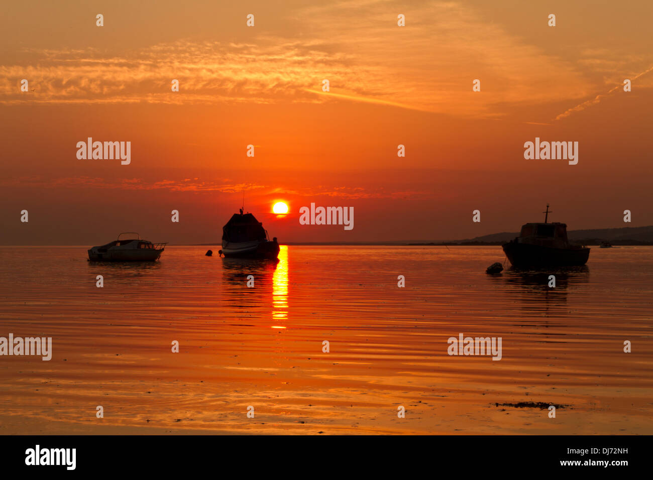 Sunset over the Penclawdd estuary Stock Photo