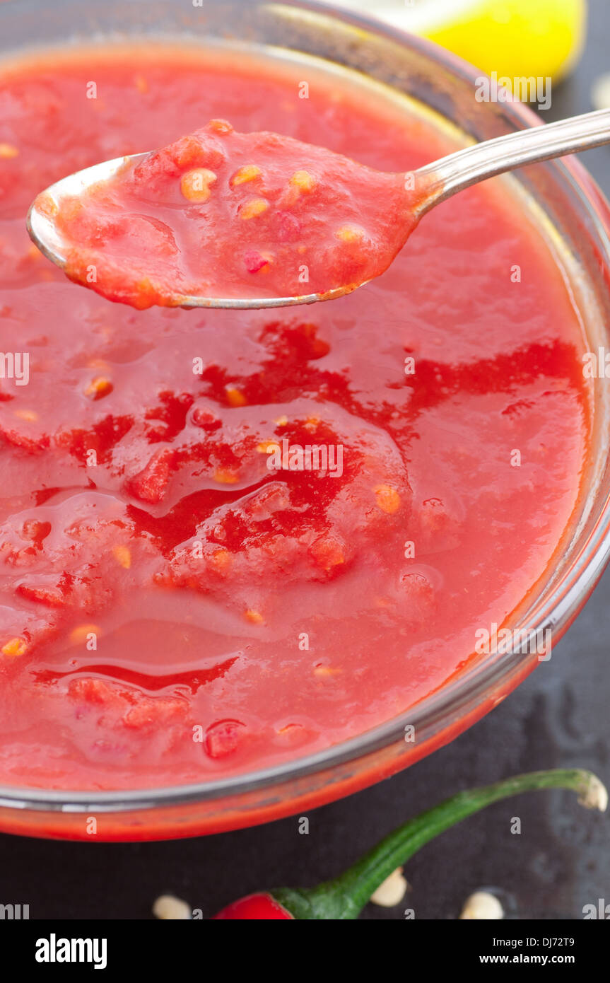 Homemade tomato and chili sauce. Stock Photo