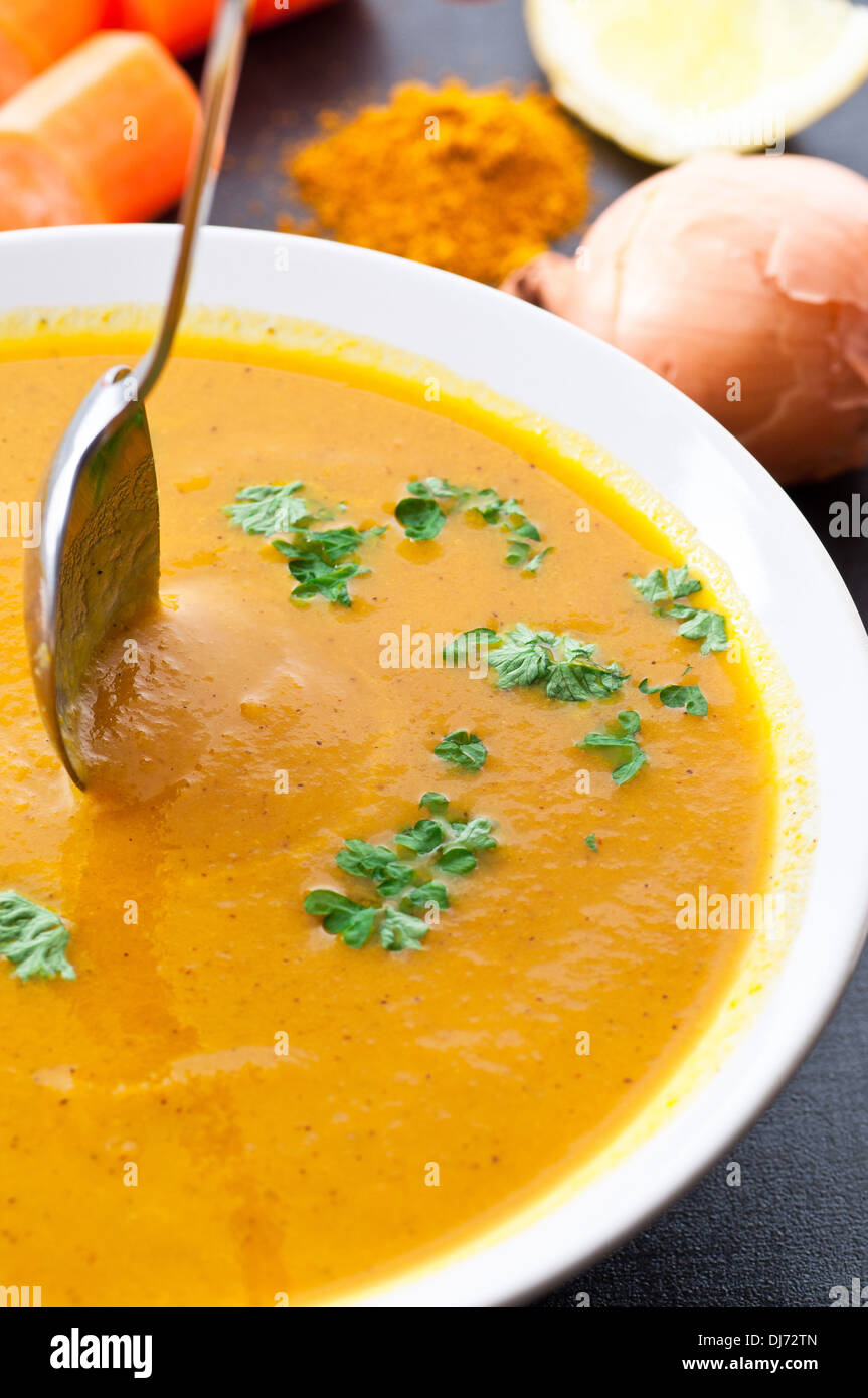Freshly cooked curried carrot soup. Stock Photo