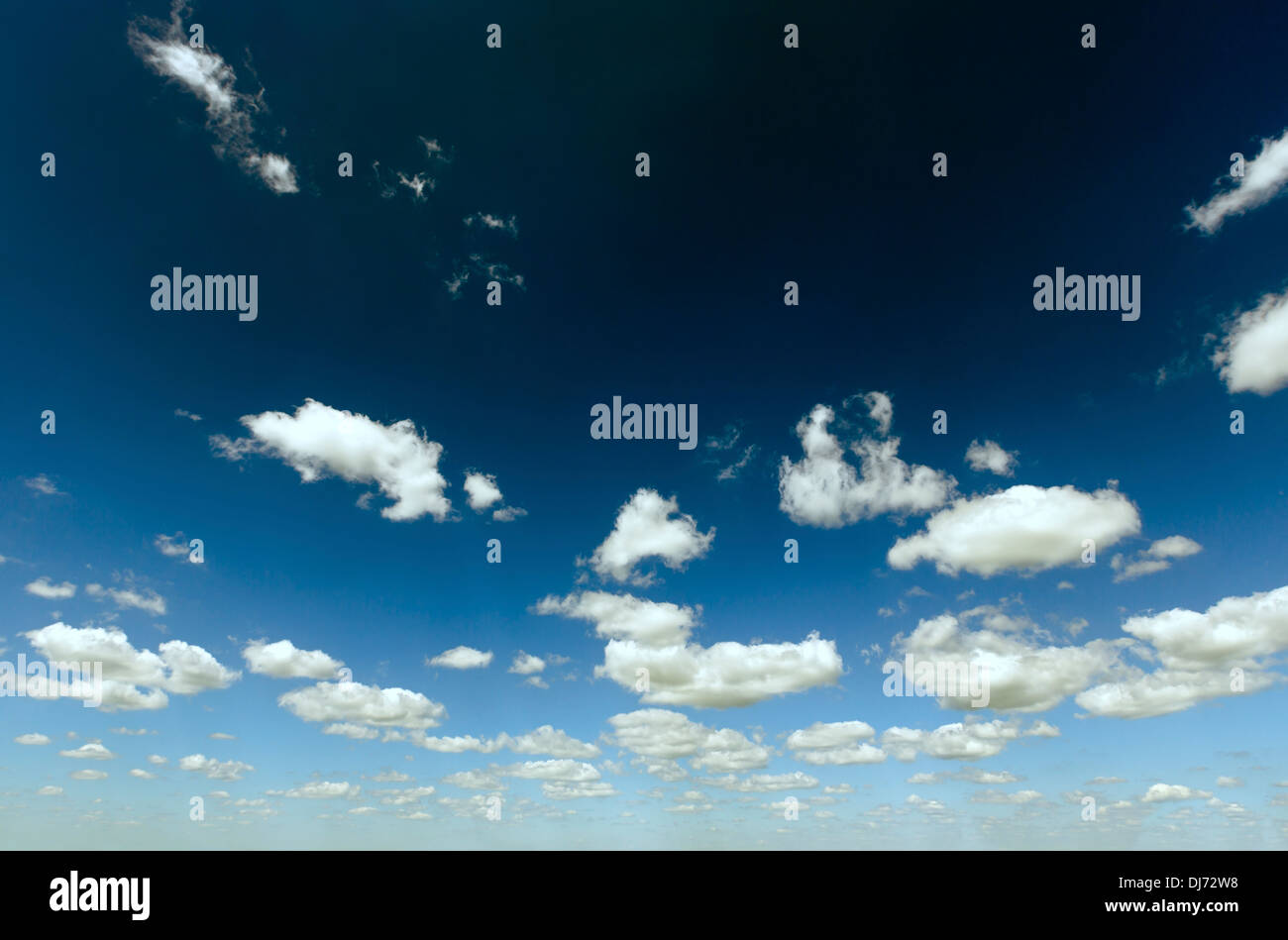 Blue sky with white cumulus clouds (nature background Stock Photo - Alamy