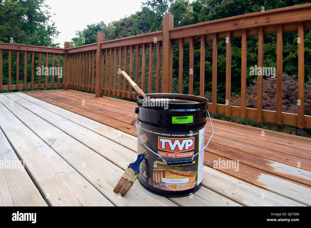 Five Gallon Bucket of Wood Stain and Preservative on Partially Stained